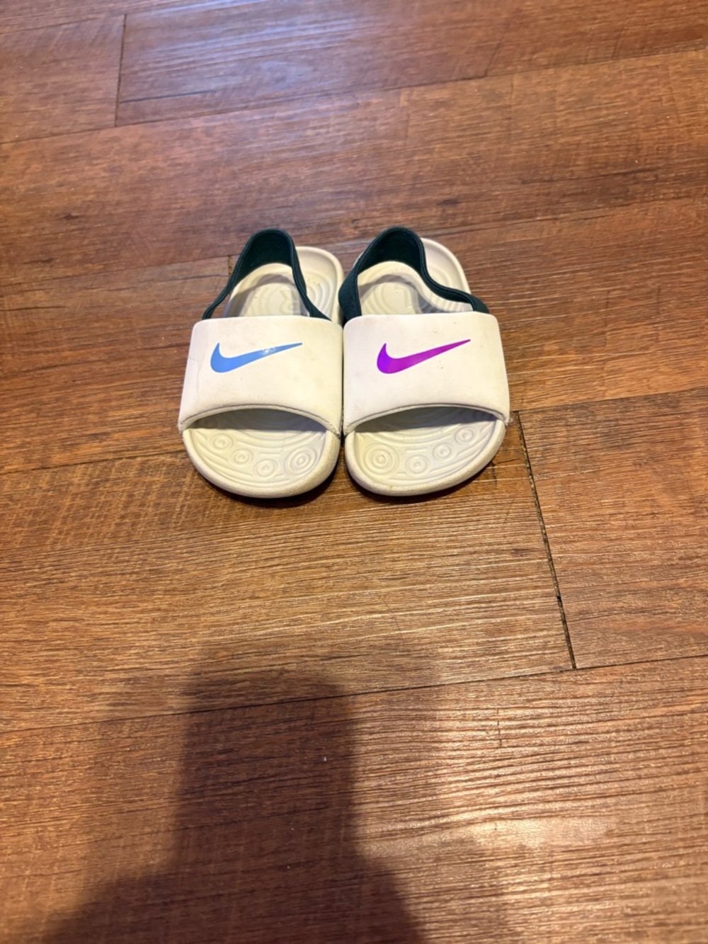 Nike Kids White Slides with Blue and Purple Swooshes